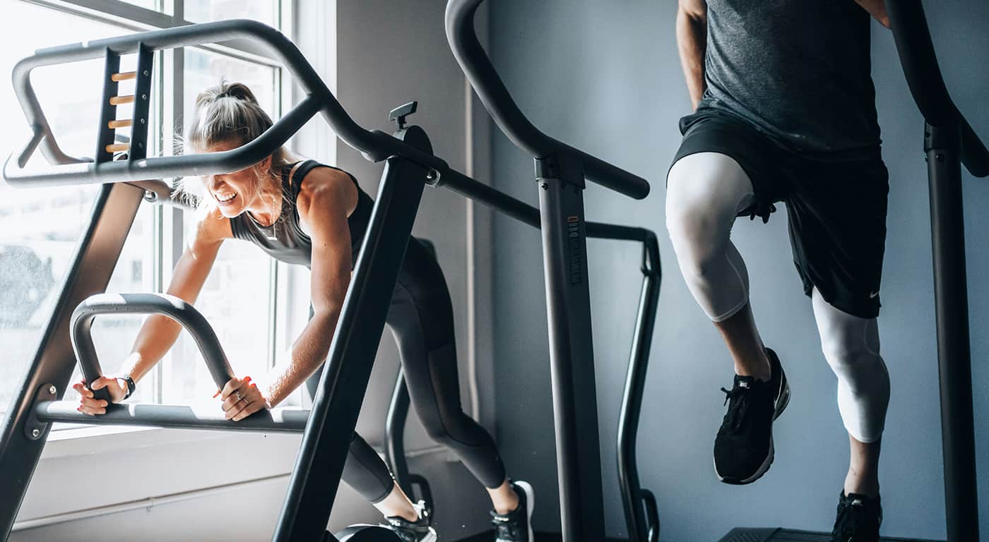 Visitors walk near Himeji Castle as tourists explore the historic site under bright daytime conditions