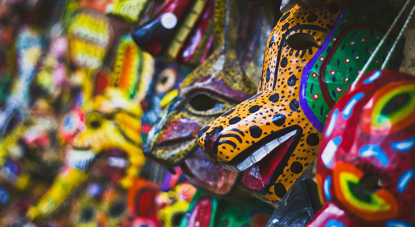Visitors walk near Himeji Castle as tourists explore the historic site under bright daytime conditions