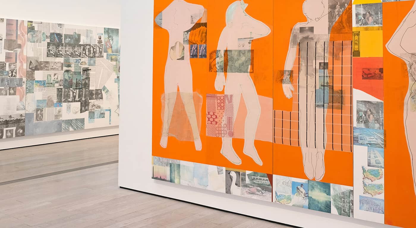 Visitors walk near Himeji Castle as tourists explore the historic site under bright daytime conditions