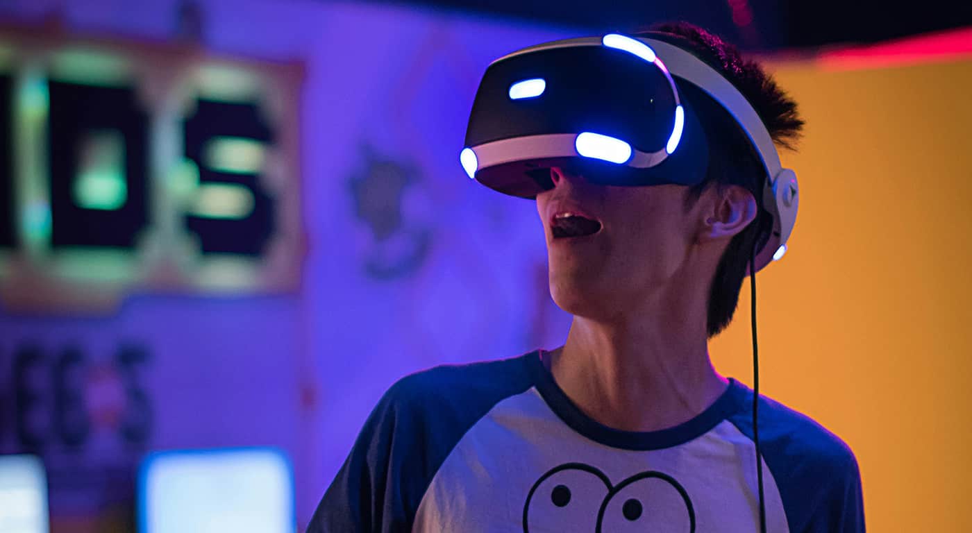 Visitors walk near Himeji Castle as tourists explore the historic site under bright daytime conditions